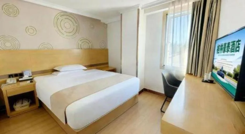 Bed in GreenTree Inn Suites HongQiao Airport Branch