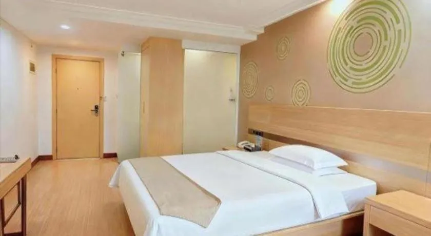 Bed in GreenTree Inn Suites HongQiao Airport Branch