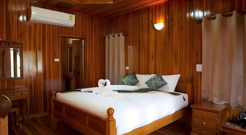 Bed in Srisawat Resort