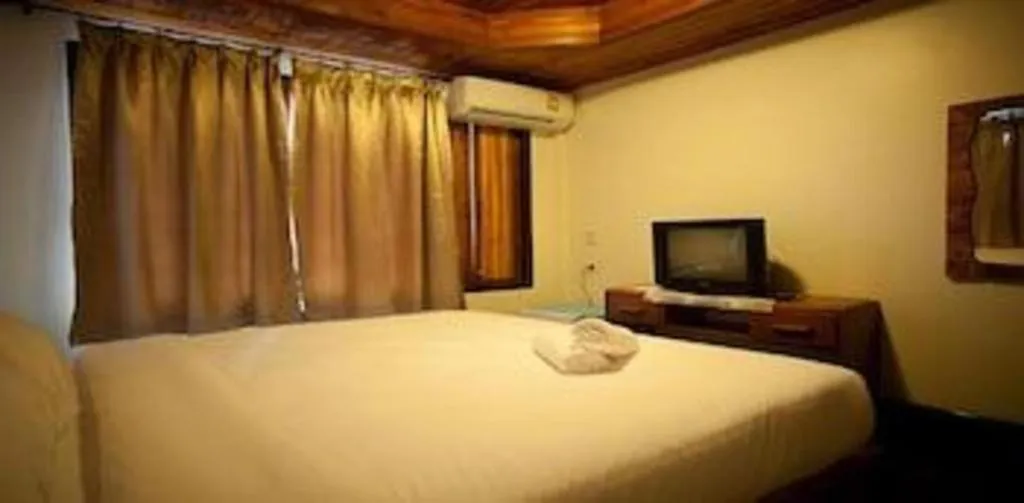 Bed in Srisawat Resort