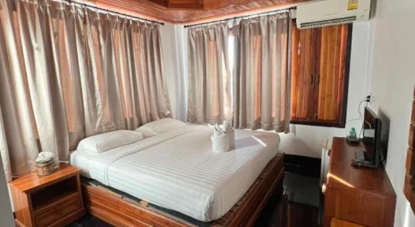 Bed in Srisawat Resort