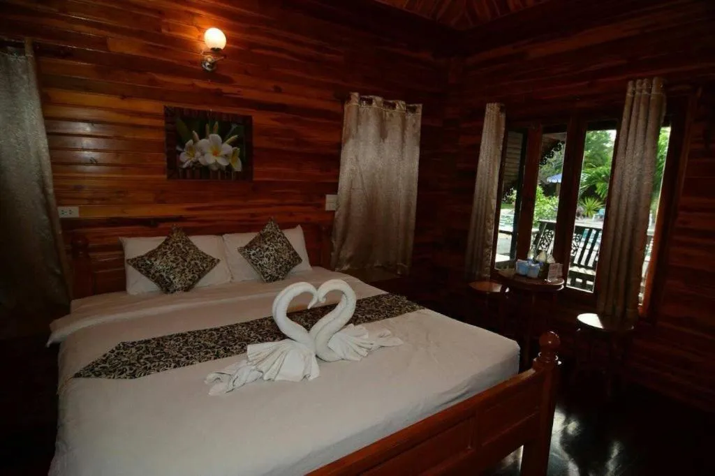 Bed in Srisawat Resort