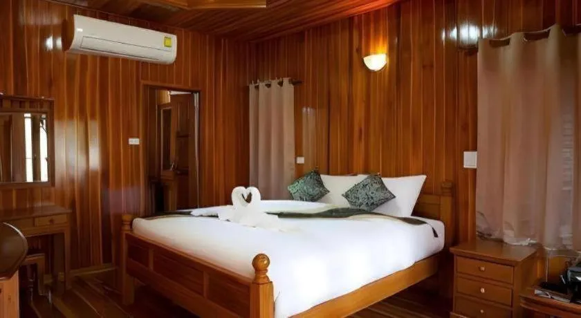 Bed in Srisawat Resort