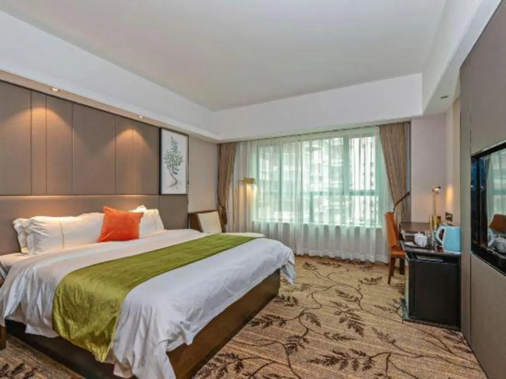 Bed in New Pearl River Hotel