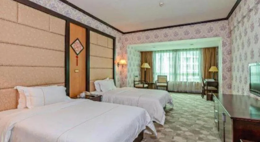 Bed in New Pearl River Hotel