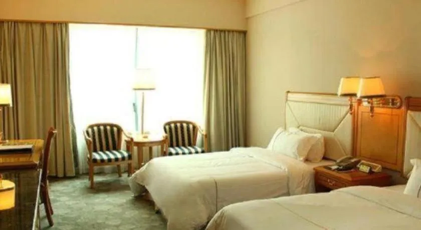 Bed in New Pearl River Hotel