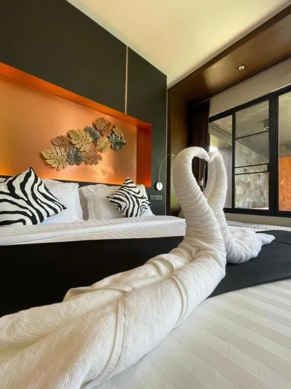 Bed in Rose Garden Samui Bungalows