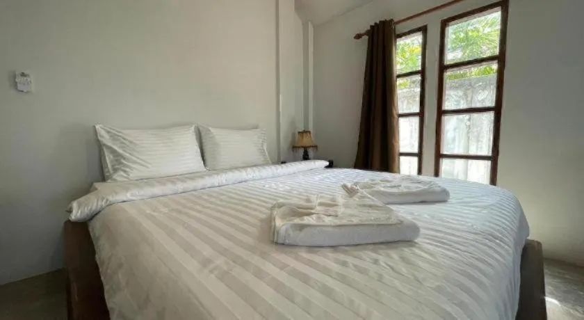Bed in Rose Garden Samui Bungalows