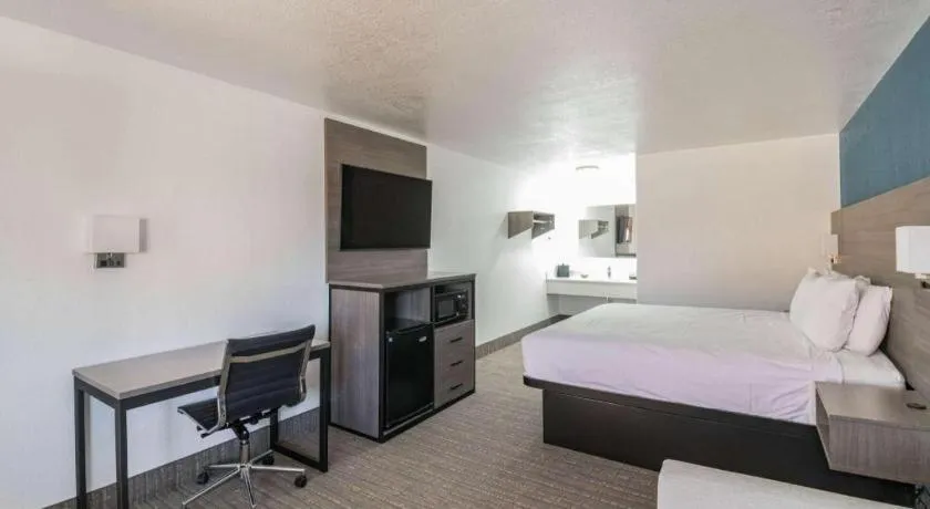 Bed in Baymont by Wyndham Grand Junction