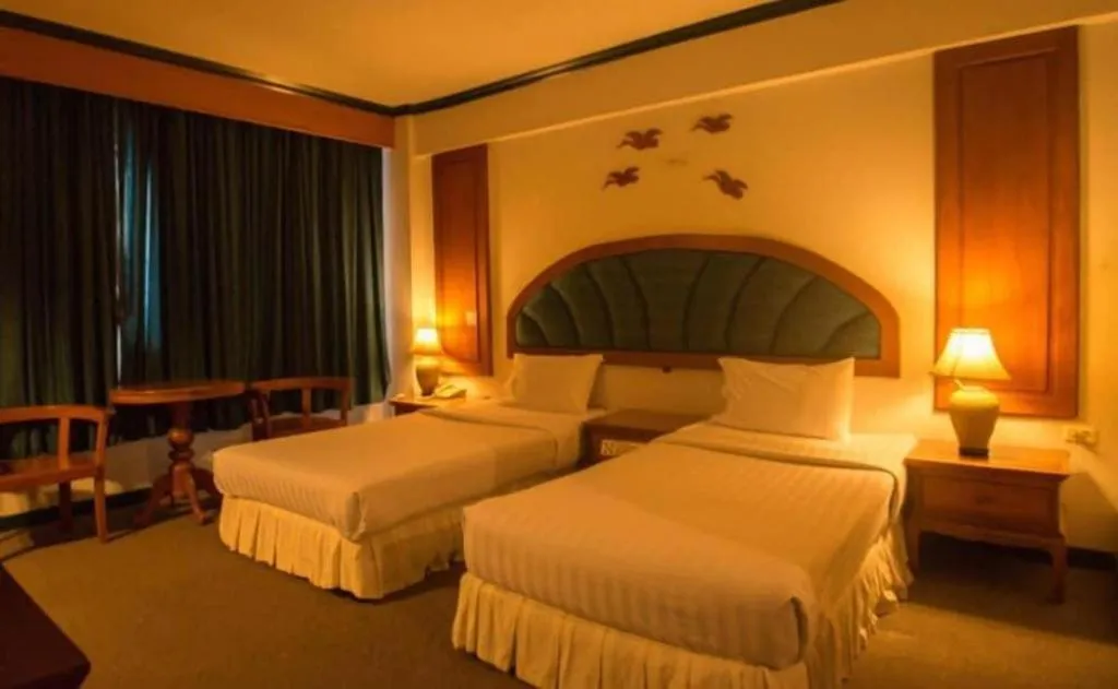 Bed in Thepnakorn Hotel