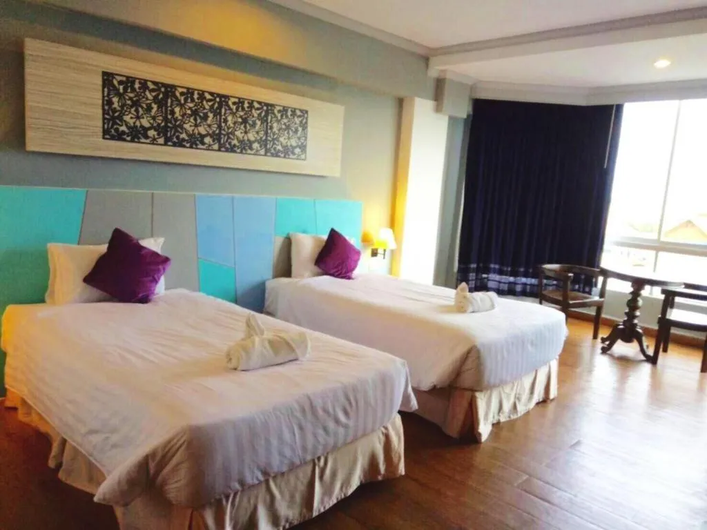 Bed in Thepnakorn Hotel