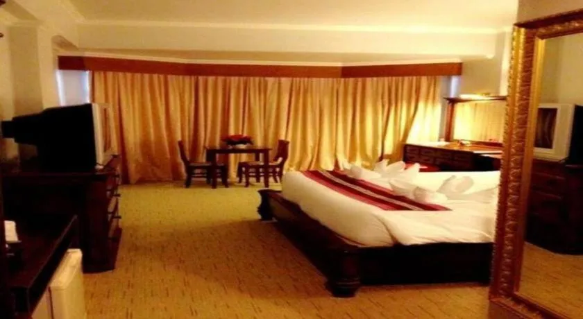 Bed in Thepnakorn Hotel