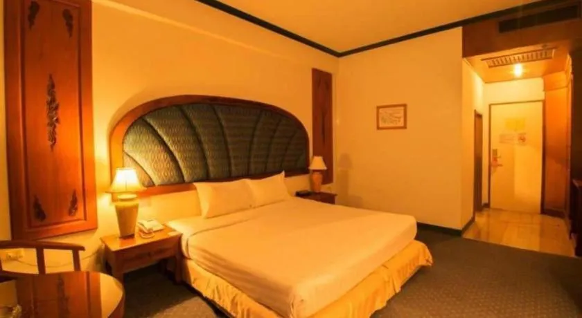 Bed in Thepnakorn Hotel