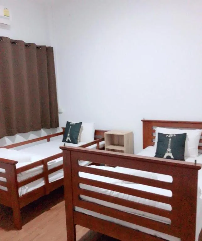 Bed in Thepnakorn Hotel