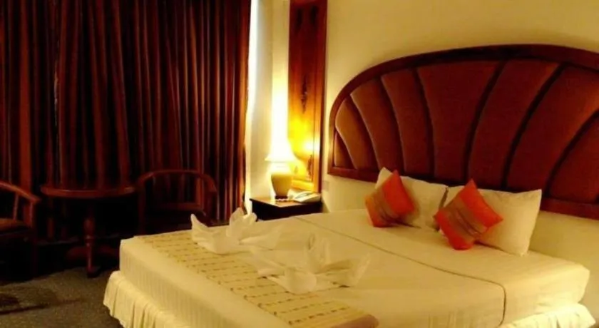 Bed in Thepnakorn Hotel