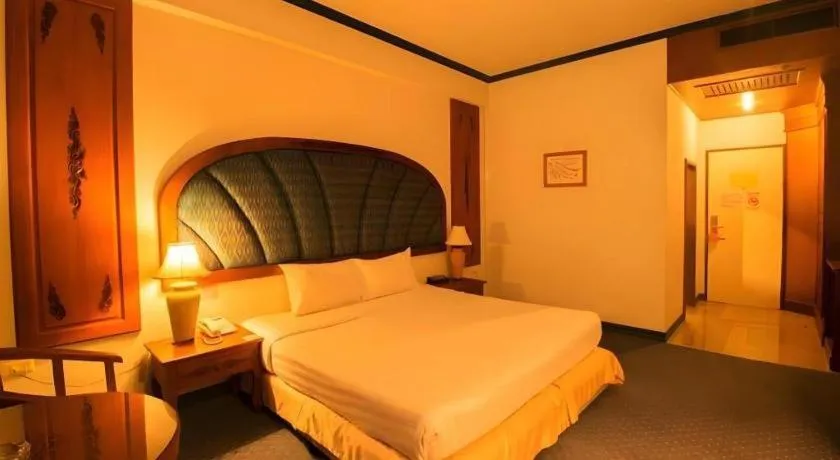 Bed in Thepnakorn Hotel