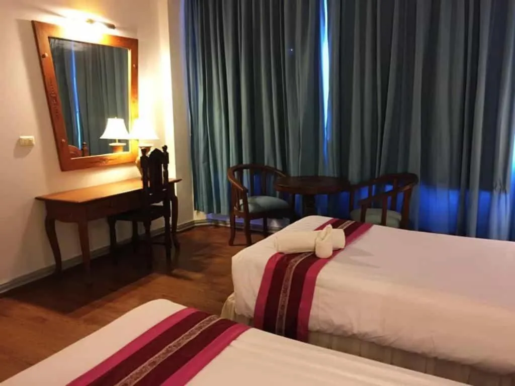 Bed in Thepnakorn Hotel