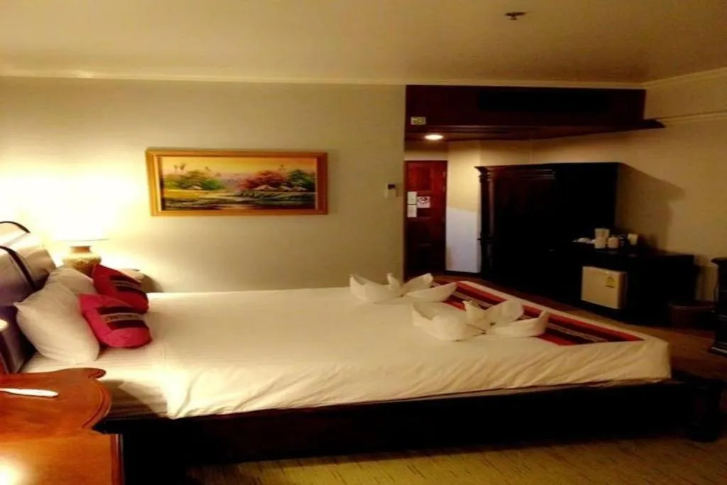 Bed in Thepnakorn Hotel