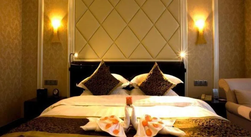 Bed in Sun City Hotel Haikou