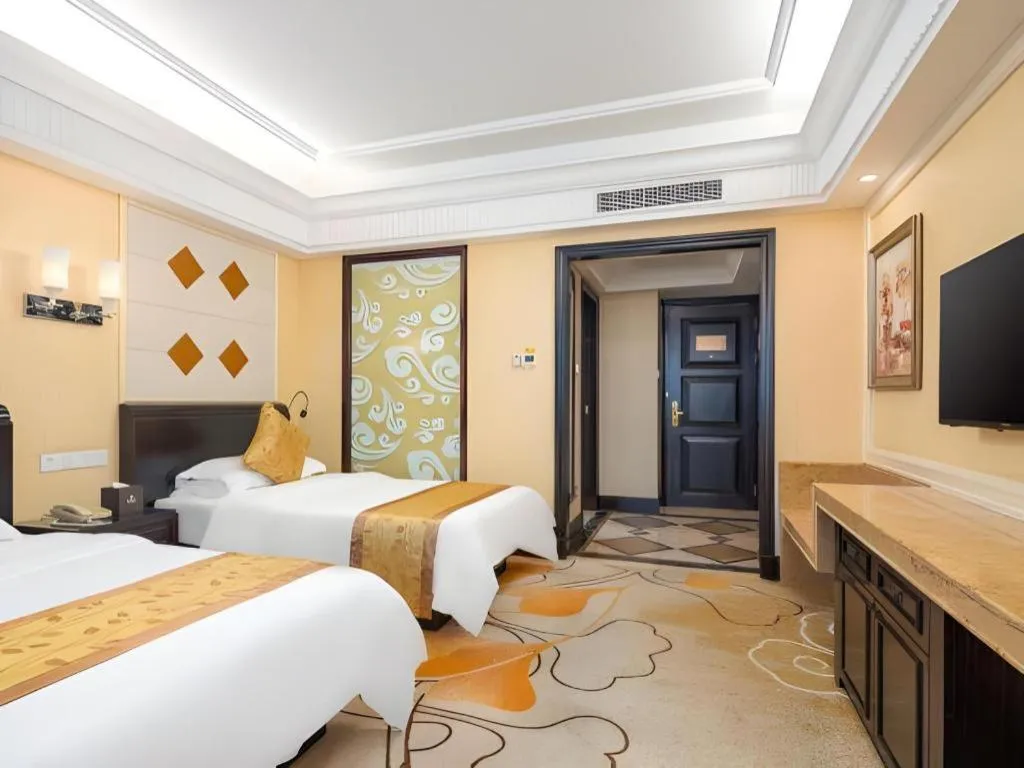 Bed in Sun City Hotel Haikou