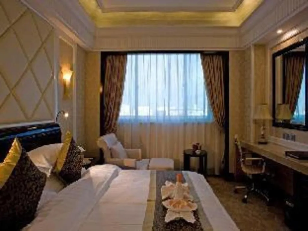 Bed in Sun City Hotel Haikou