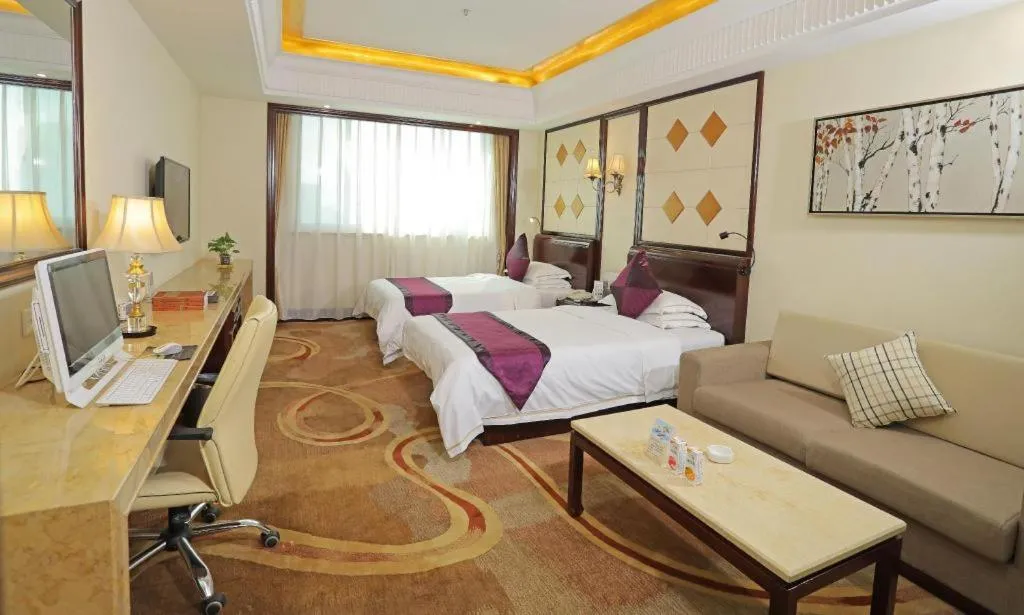 Bed in Sun City Hotel Haikou