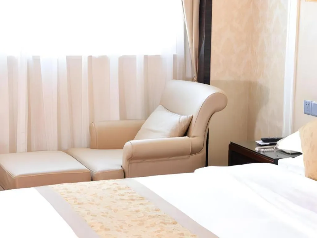 Bed in Sun City Hotel Haikou
