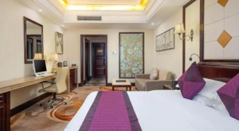 Bed in Sun City Hotel Haikou