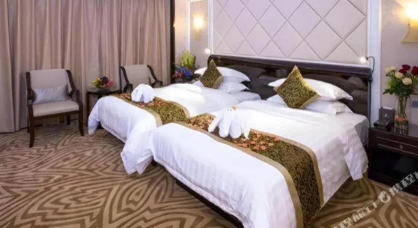 Bed in Sun City Hotel Haikou