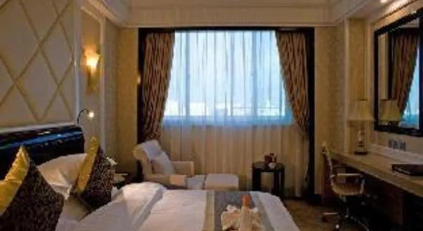 Bed in Sun City Hotel Haikou