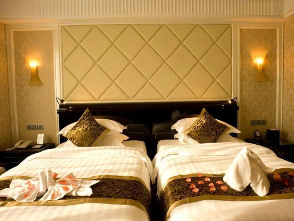 Bed in Sun City Hotel Haikou