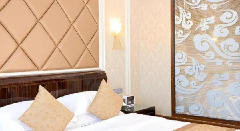 Bed in Sun City Hotel Haikou