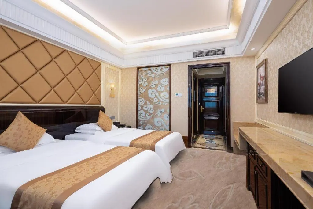 Bed in Sun City Hotel Haikou