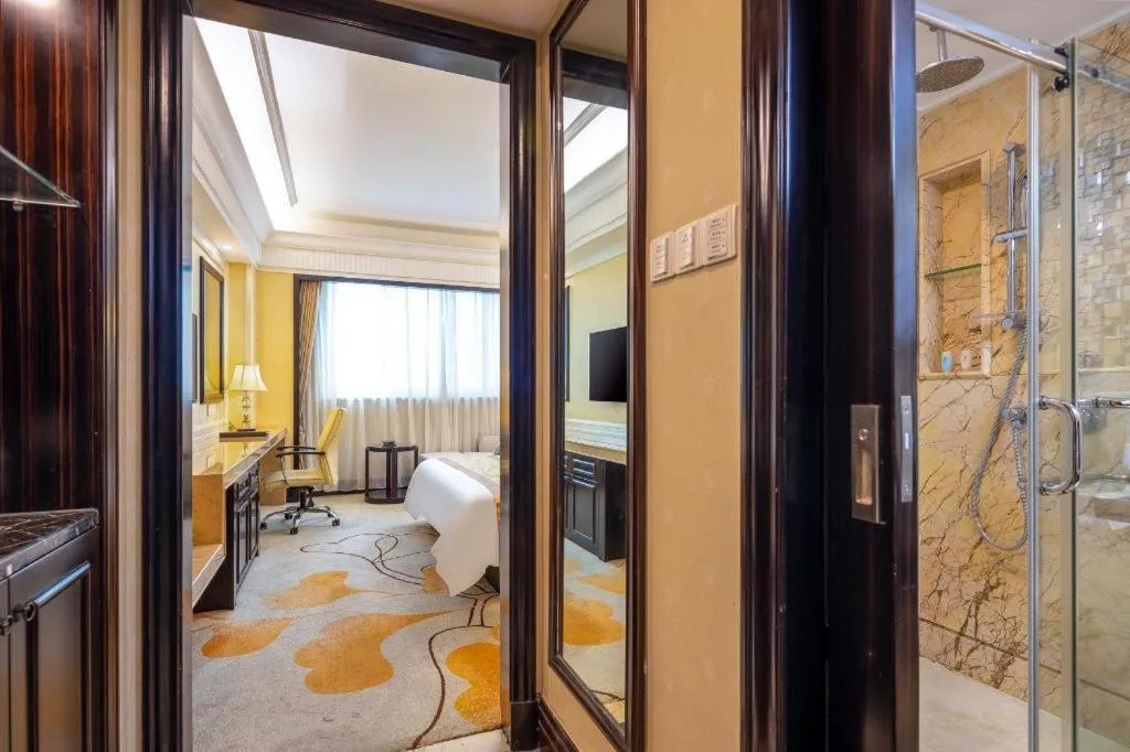 Bed in Sun City Hotel Haikou