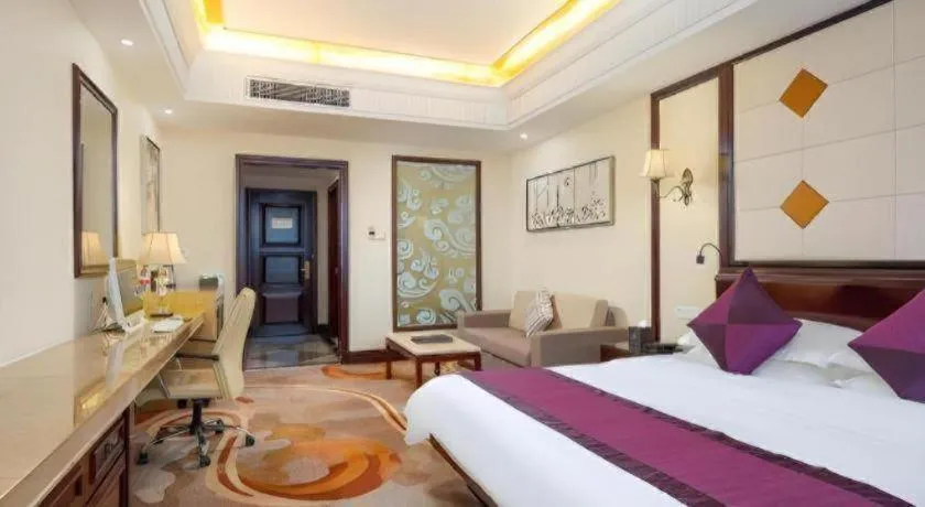 Bed in Sun City Hotel Haikou