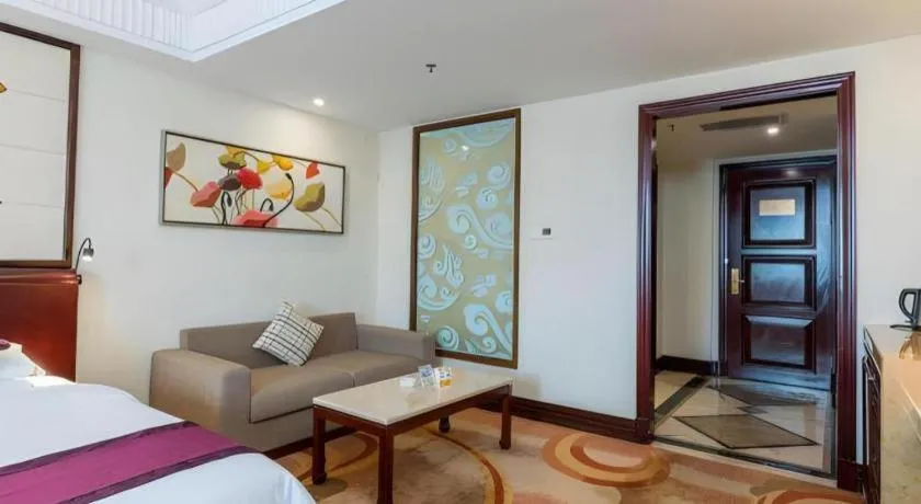 Bed in Sun City Hotel Haikou