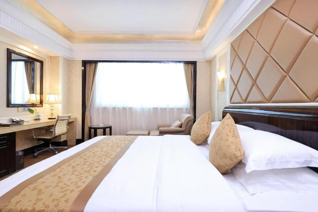 Bed in Sun City Hotel Haikou