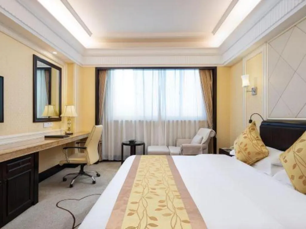 Bed in Sun City Hotel Haikou