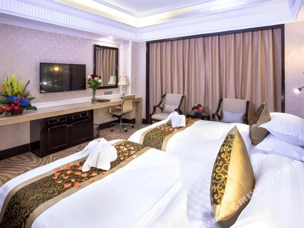 Bed in Sun City Hotel Haikou