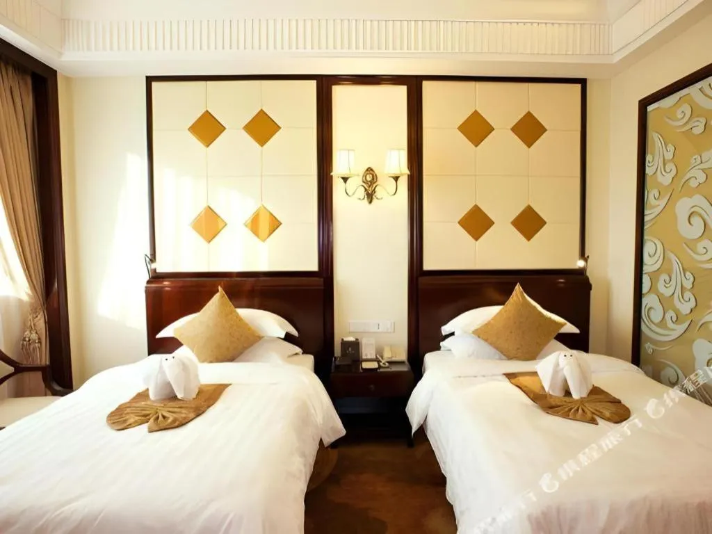 Bed in Sun City Hotel Haikou