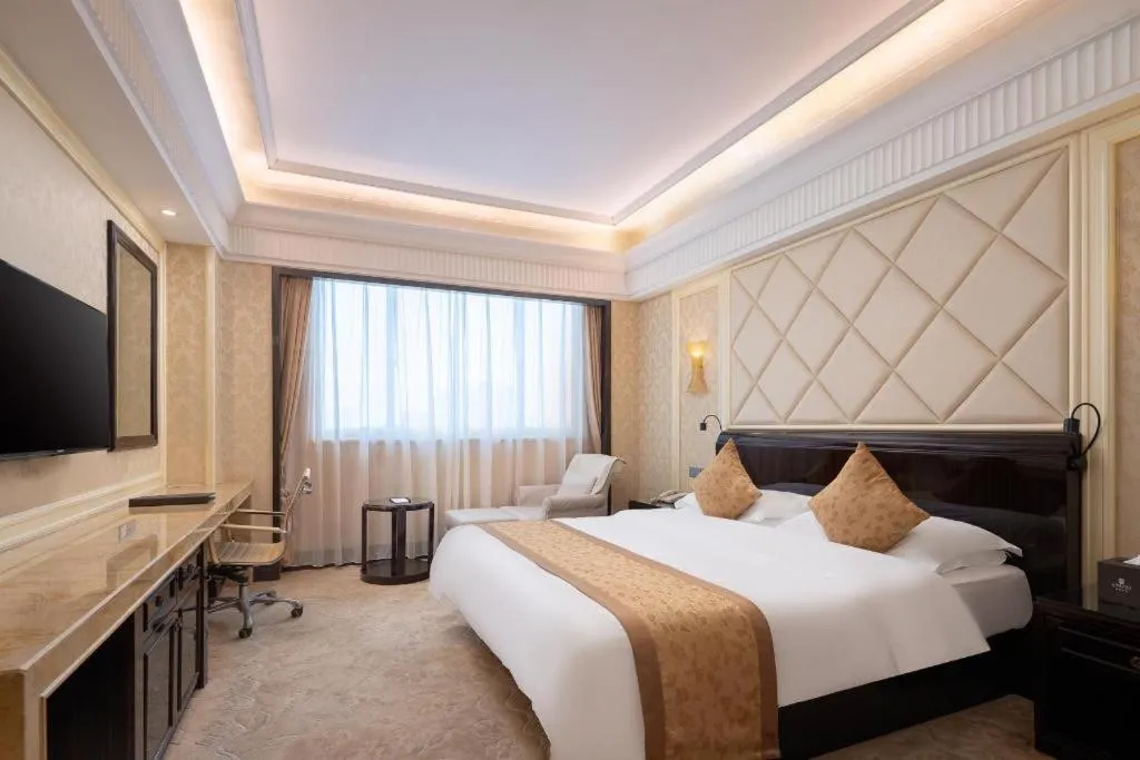 Bed in Sun City Hotel Haikou