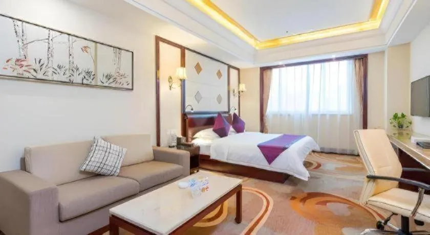 Bed in Sun City Hotel Haikou