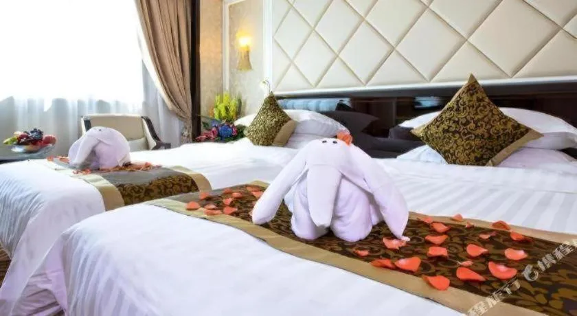 Bed in Sun City Hotel Haikou