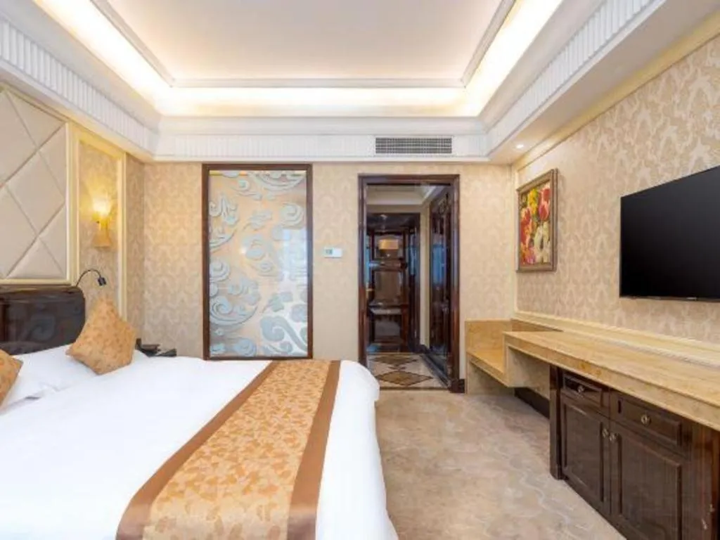 Bed in Sun City Hotel Haikou