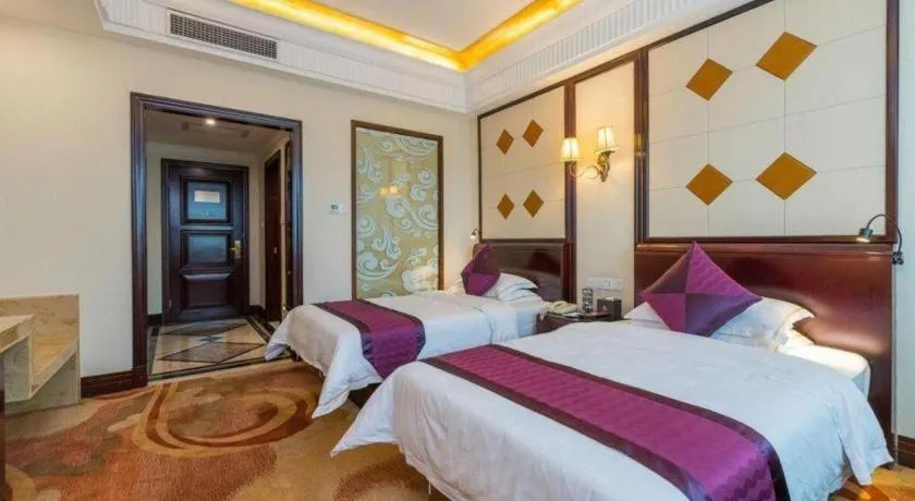 Bed in Sun City Hotel Haikou