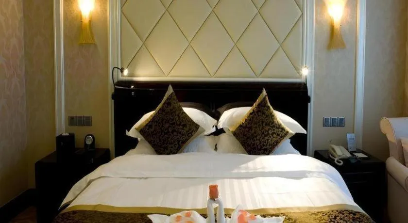 Bed in Sun City Hotel Haikou