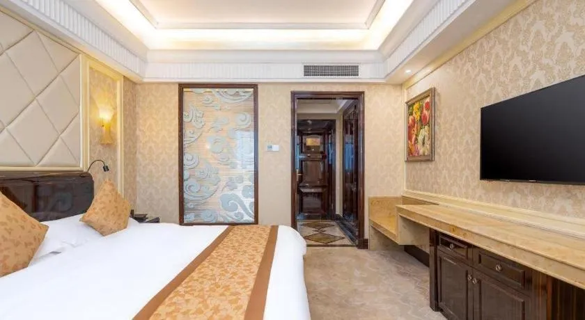 Bed in Sun City Hotel Haikou