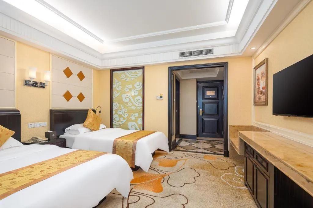 Bed in Sun City Hotel Haikou