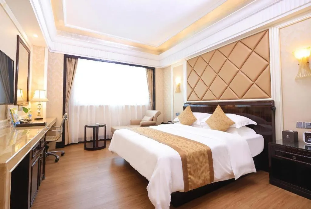 Bed in Sun City Hotel Haikou