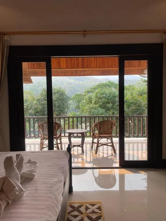 Bed in Nam Ou Riverside Resort